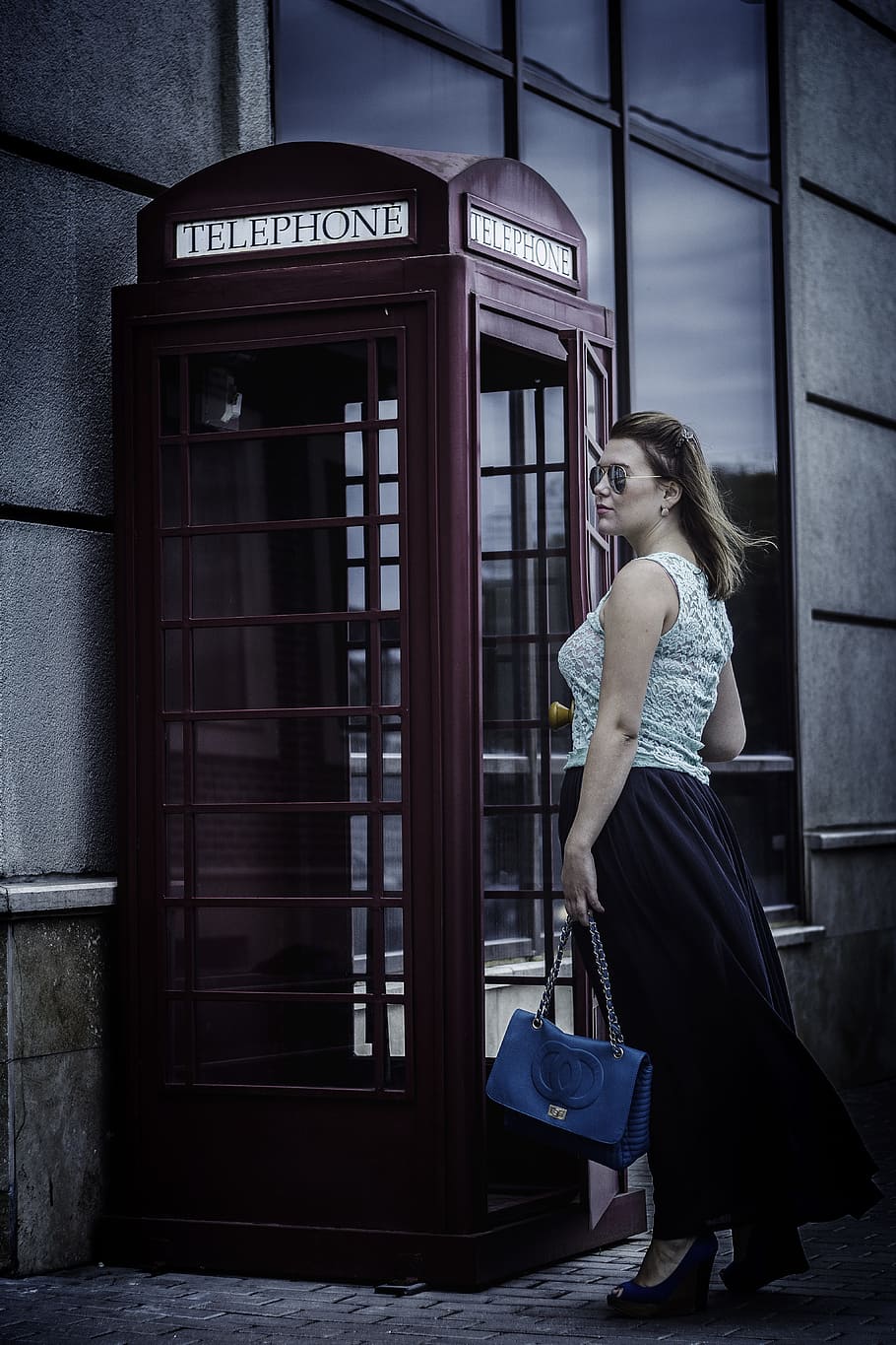 woman standing in front of telephone booth, london, fog, girl