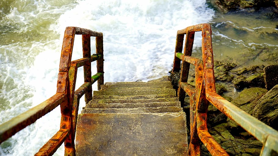 high-angle view of concrete ladder over body of water, rusty HD wallpaper