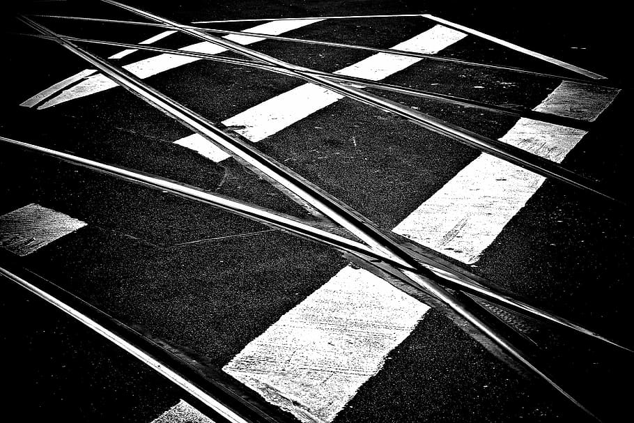 grayscale photo of pavement, road, seemed, traffic, train, gleise HD wallpaper