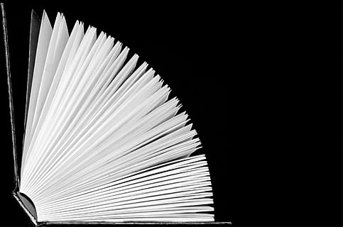 black hardbound book on black surface, open, page, pages, books HD wallpaper