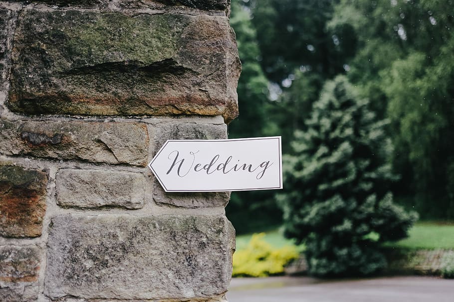 wedding signage on wall, focus photography of wedding signage HD wallpaper