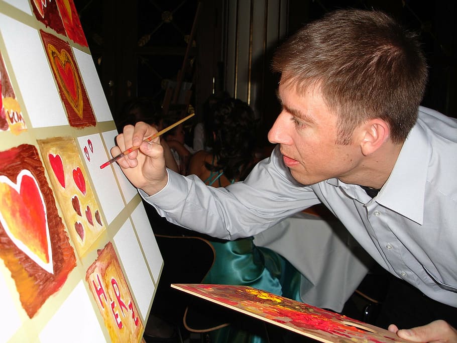 man painting brown and red hearts on white canvas, painter HD wallpaper