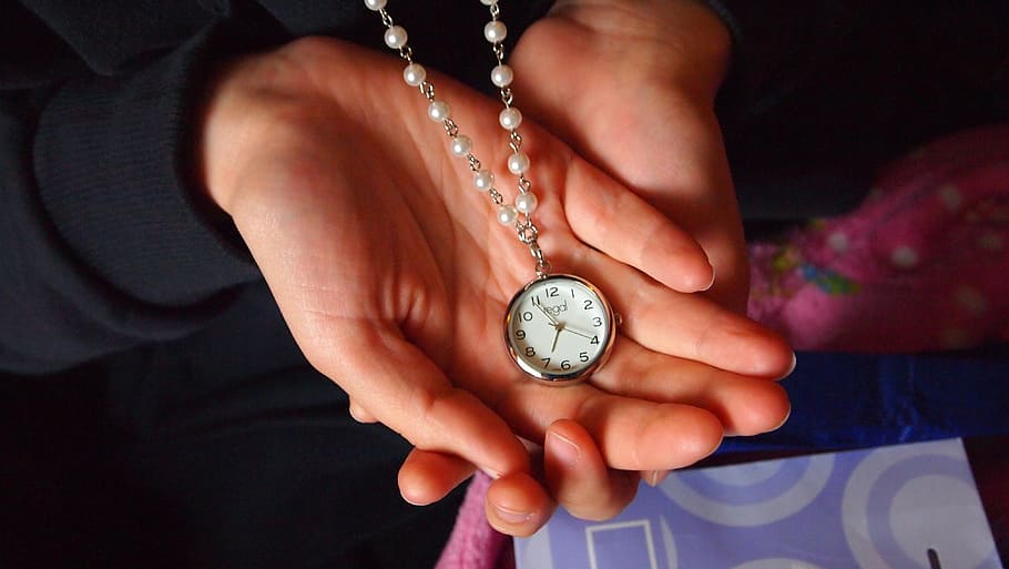 person holding beaded necklace with watch pendant, hand, time HD wallpaper