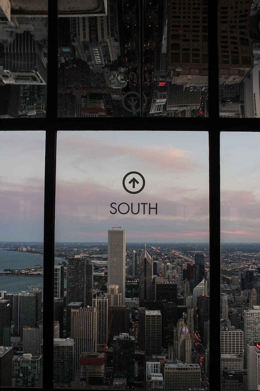 photo of gray concrete buildings, clear glass wall with South sticker HD wallpaper