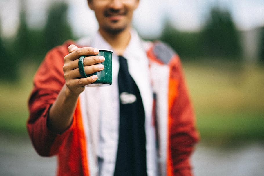 blur, cup, hand, man, mug, outdoors, person, people, one Person HD wallpaper