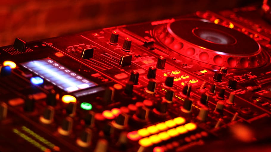 selective focus photo of DJ controller, mixer, device, audio