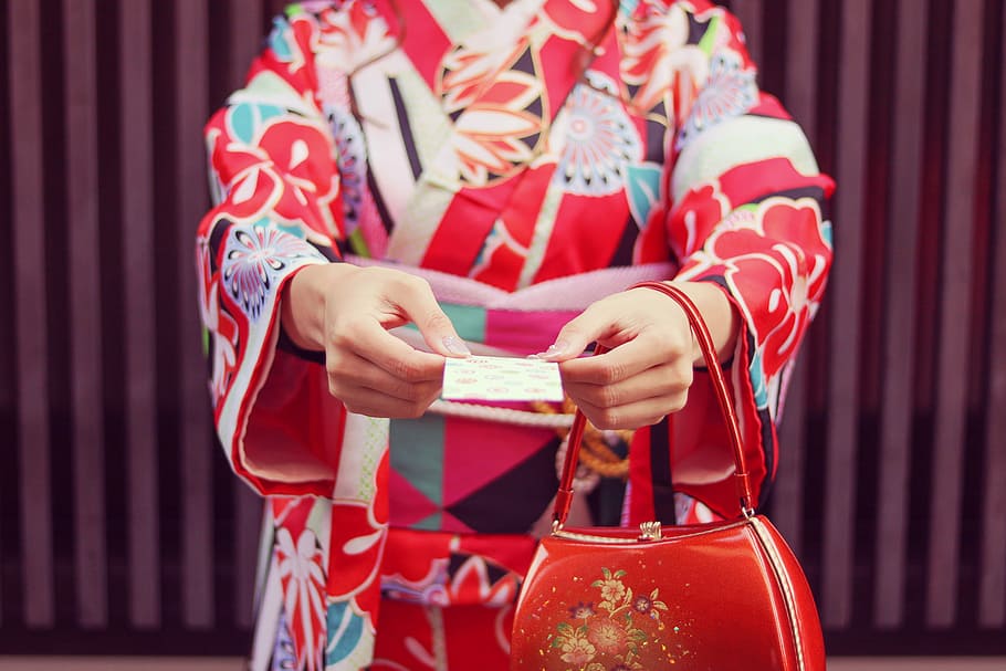 woman holding paper wearing floral kimono and handbag, japan HD wallpaper