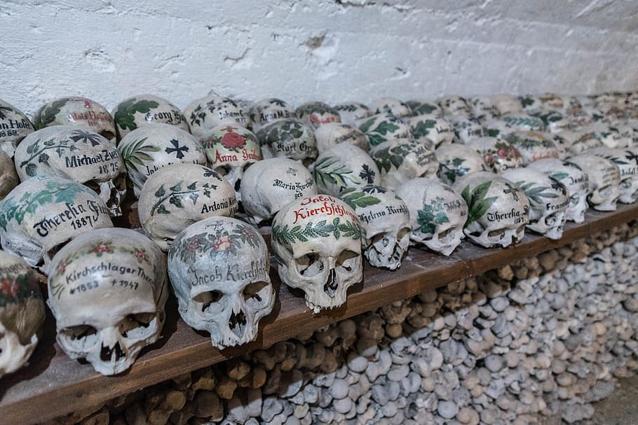 Ossuary, Bone, Skull, Hallstadt, skull bone, head, bones, skull and crossbones HD wallpaper