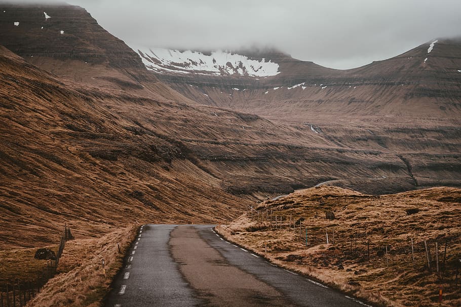 road in between brown mountains, empty road with mountain at distance HD wallpaper