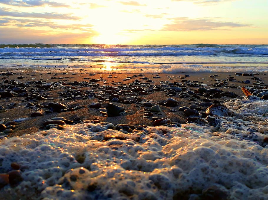 spray, beach, sunset, sea, stones, sand, evening sun, evening sky HD wallpaper