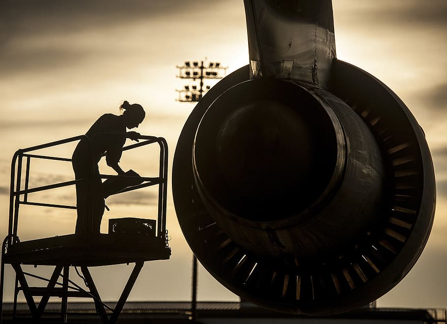 silhouette of person checking on airplane jet engines, mechanic, HD wallpaper