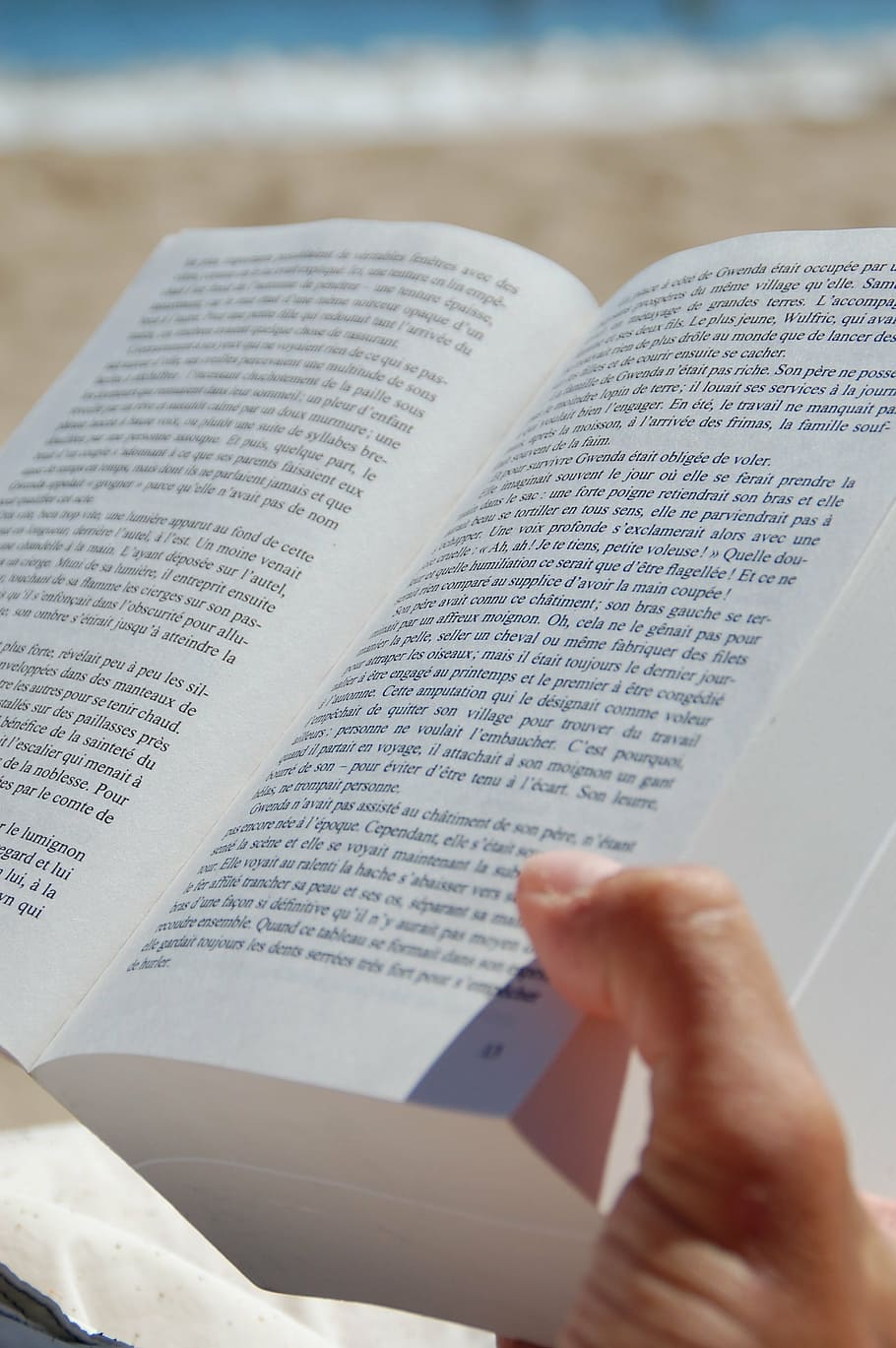 person reading opened book, open book, page, publication, human body part HD wallpaper