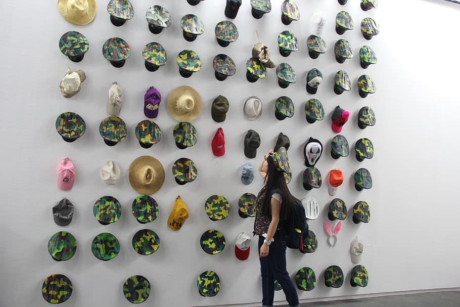 museum, hat, girl, one person, large group of objects, indoors