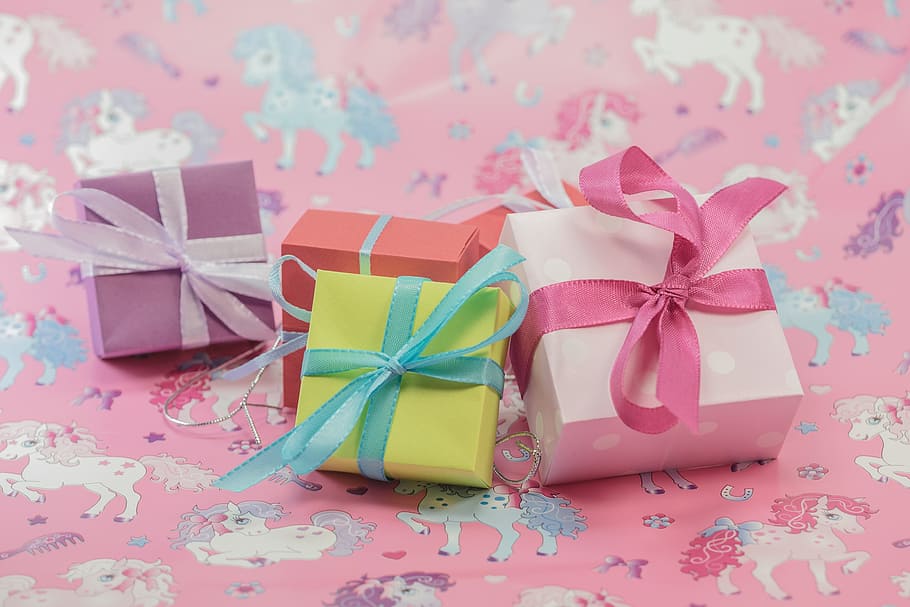 several assorted-color boxes on top of pink textile, gift, made HD wallpaper