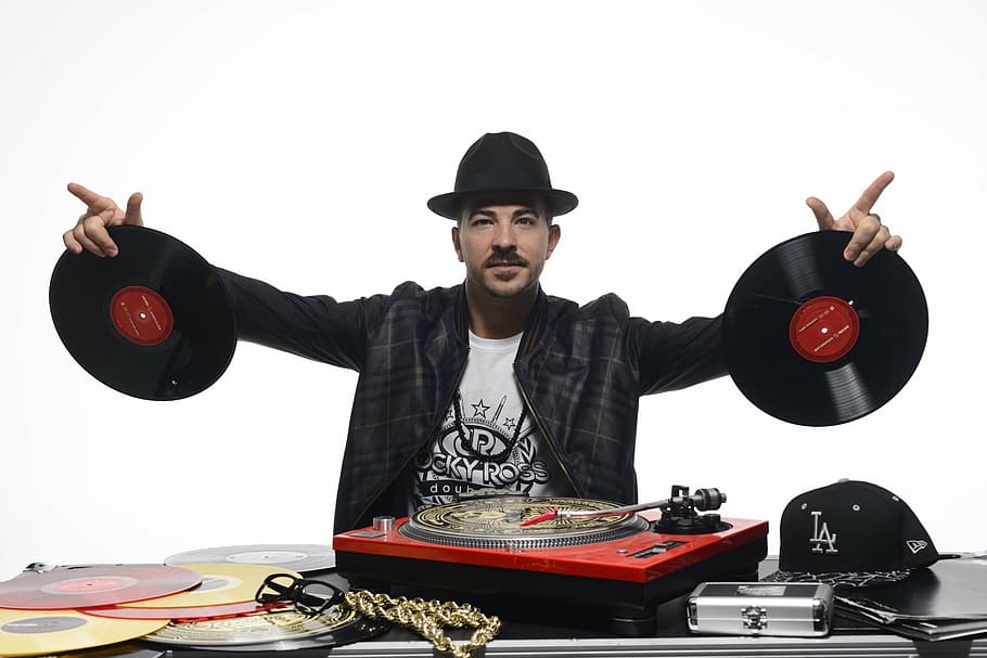 man holding vinyl records, dj, turntable, scratch, hip hop, culture