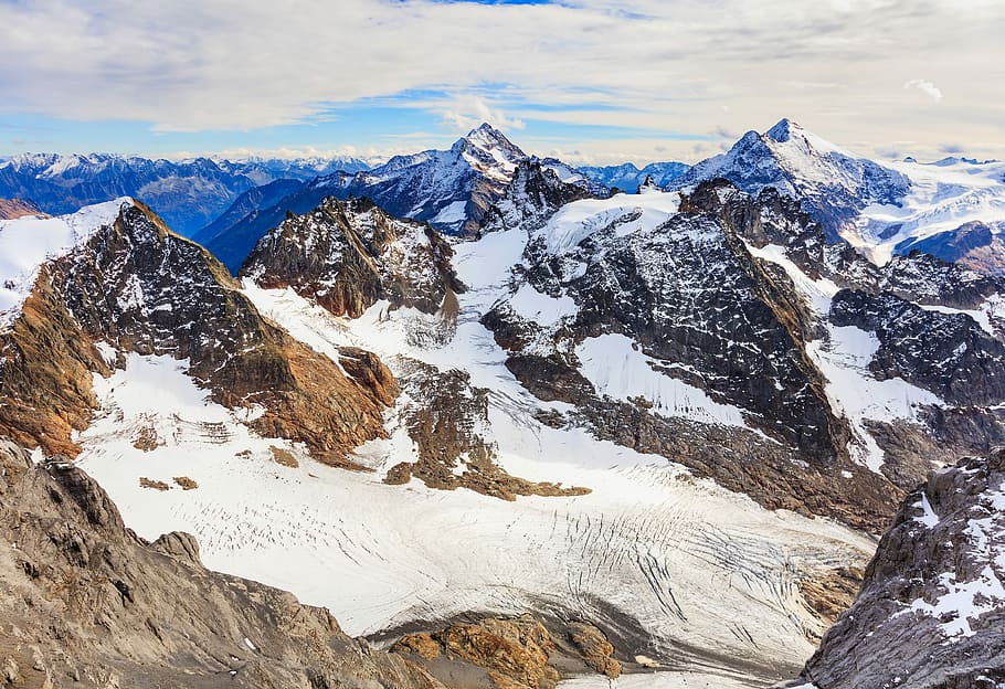 top view of snowy mountain, landscape photo of mountain with snowfield HD wallpaper
