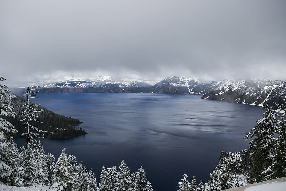 body of water surrounded by mountain covered with fog landscape photo, aerial landscape lake shot HD wallpaper