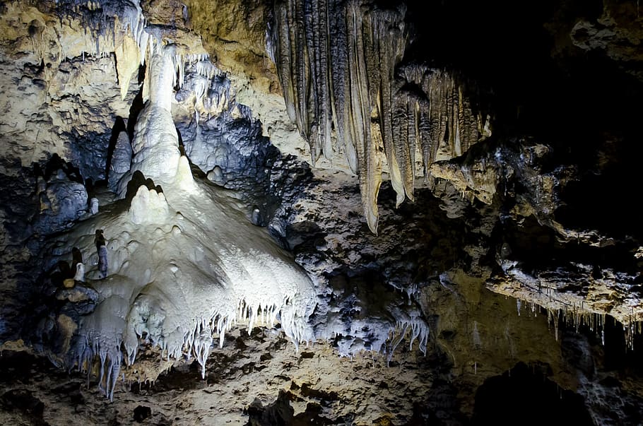 person showing cave, stalagtit, stalactite, white, blue, swiss francs HD wallpaper