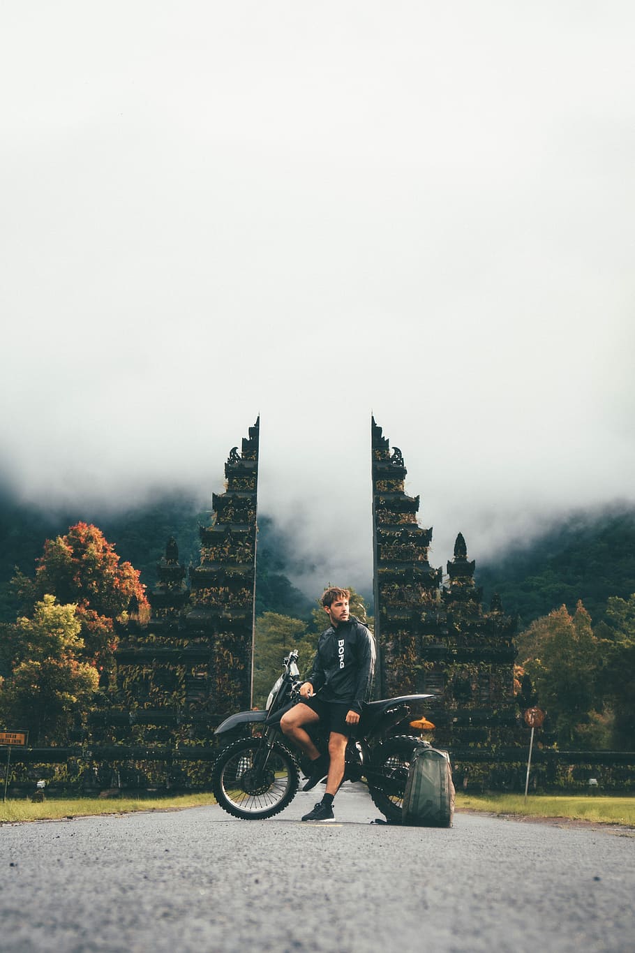 man sitting on motocross dirt bike, road, street, travel, people