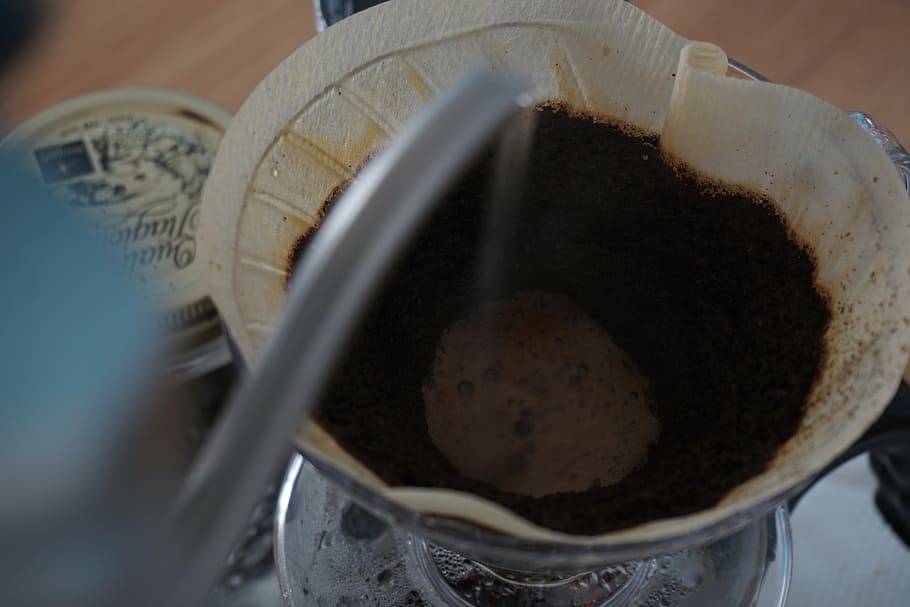 silver kettle poured onto cylindrical white cup, coffee, drip coffee HD wallpaper