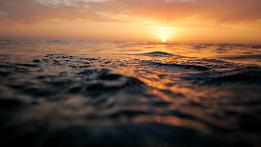 body of water during sunset, ocean, surface, waves, sea, pattern HD wallpaper