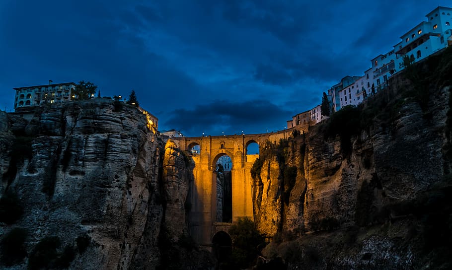 gray concrete castle on top of mountain during night time, brown castle HD wallpaper