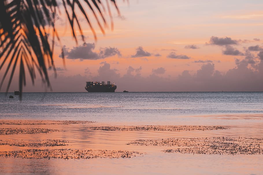 silhouette of ship on body of water during golden hour, black ship HD wallpaper