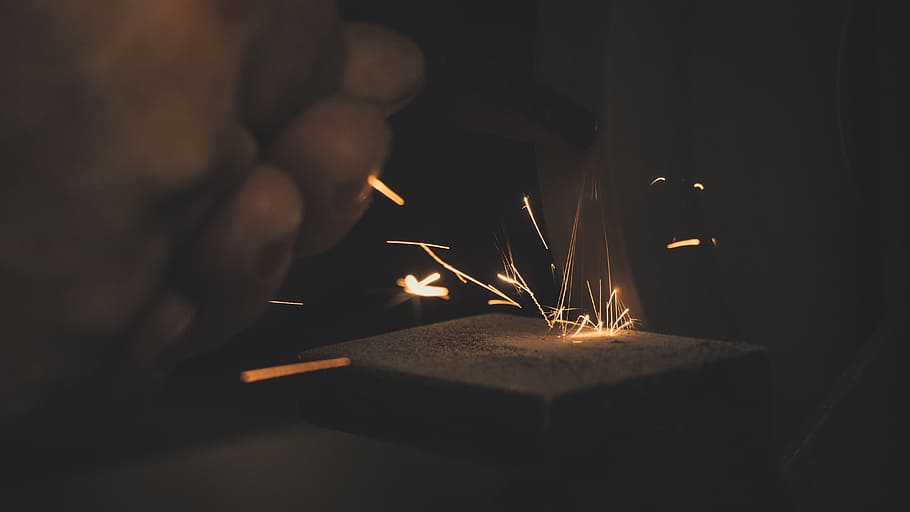 Photo of Hand With Spark, blur, close-up, dark, hands, heat, insubstantial HD wallpaper