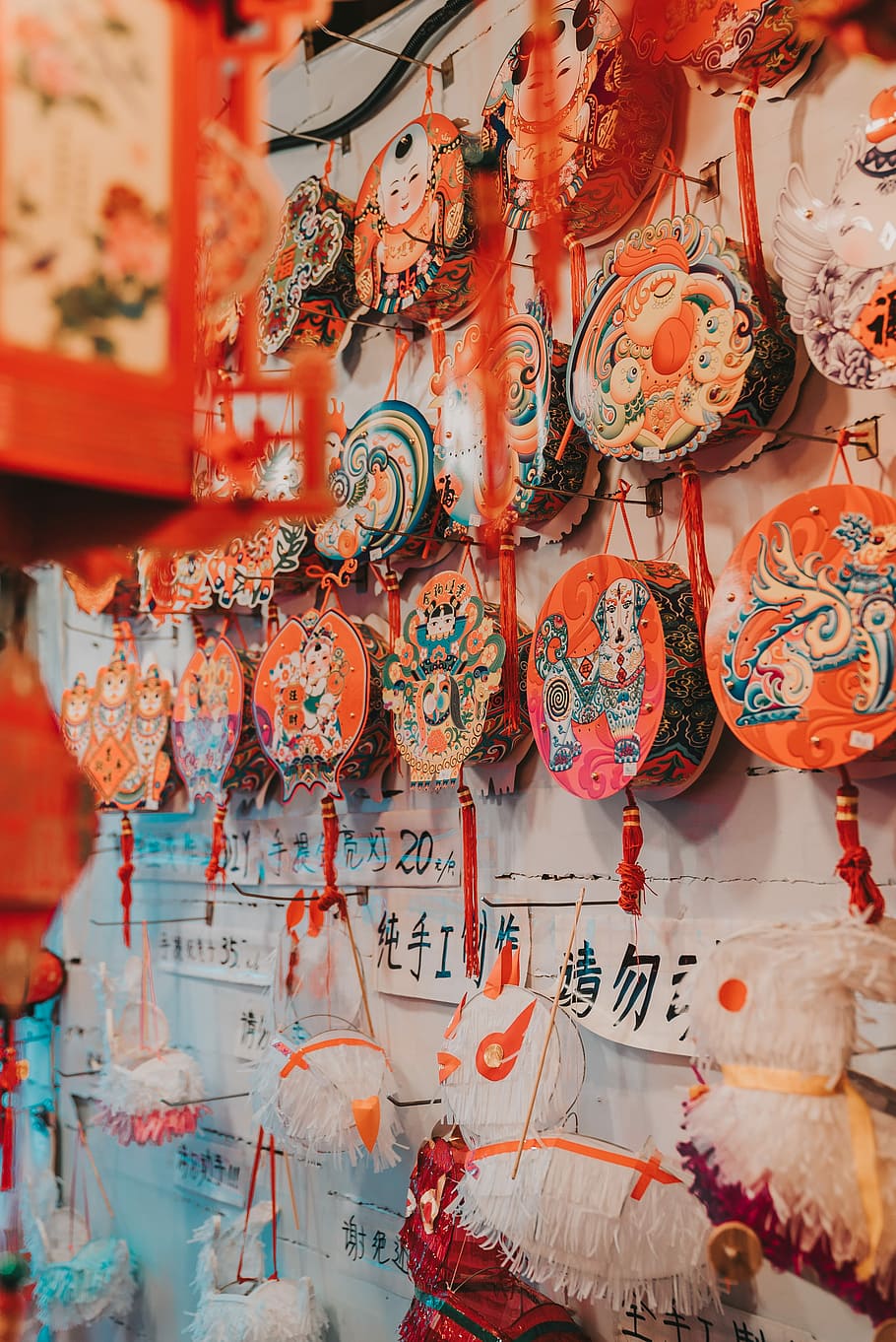 orange and teal hanging decors on wall, assorted-color decor lot HD wallpaper
