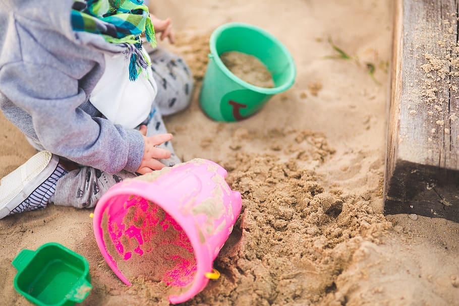 toddler's playing sand on green and pink buckets, sandpit, child, HD wallpaper