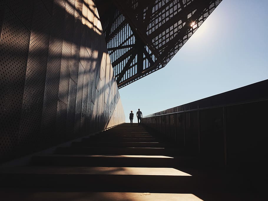 two people standing on staircase, two person walking in the stairs HD wallpaper