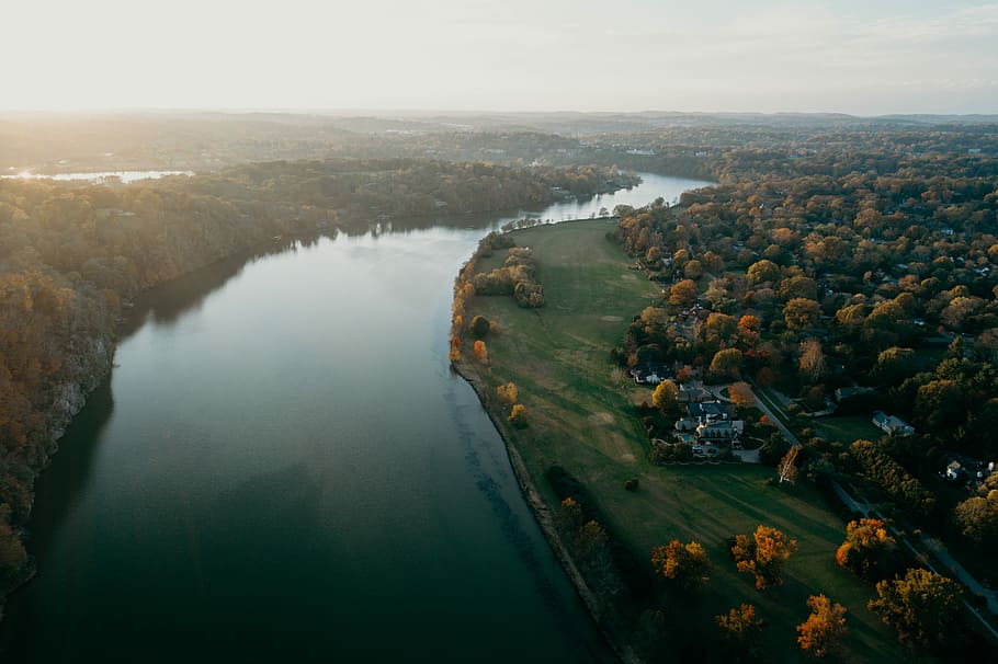 aerial photo of body of water between forests, river between forests during golden time HD wallpaper