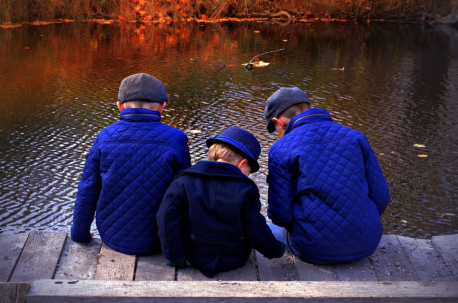three boys sitting on boardwalk during daytime, autumn, fall HD wallpaper