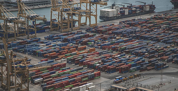 intermodal containers on dock, aerial photography of shipment containers beside body of water at daytime HD wallpaper