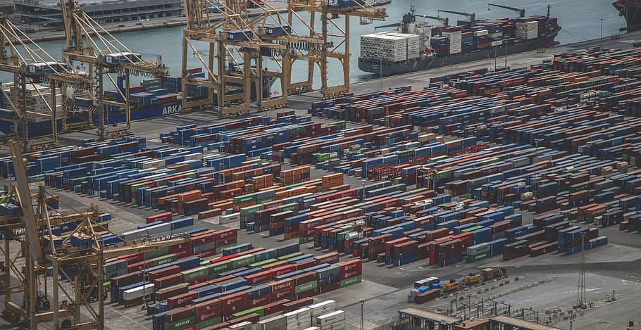 intermodal containers on dock, aerial photography of shipment containers beside body of water at daytime HD wallpaper