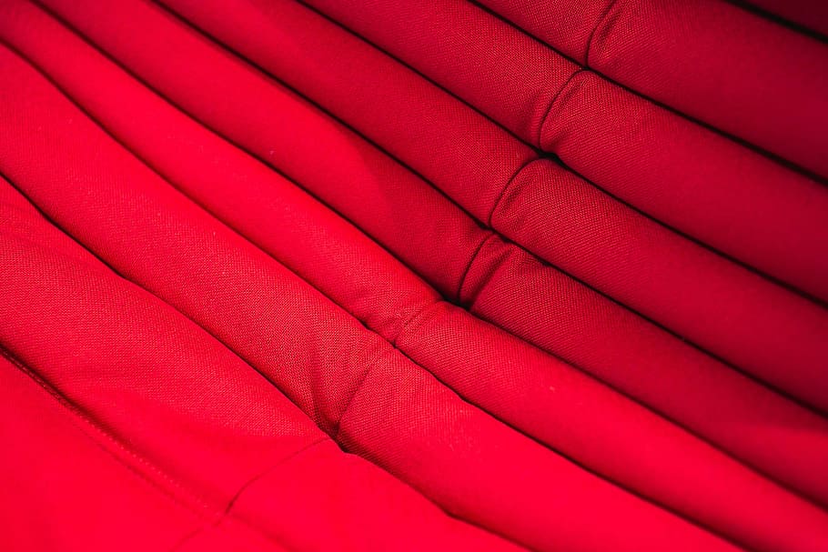 Folded sweaters and fabrics stacked on shelves, blanket, material HD wallpaper