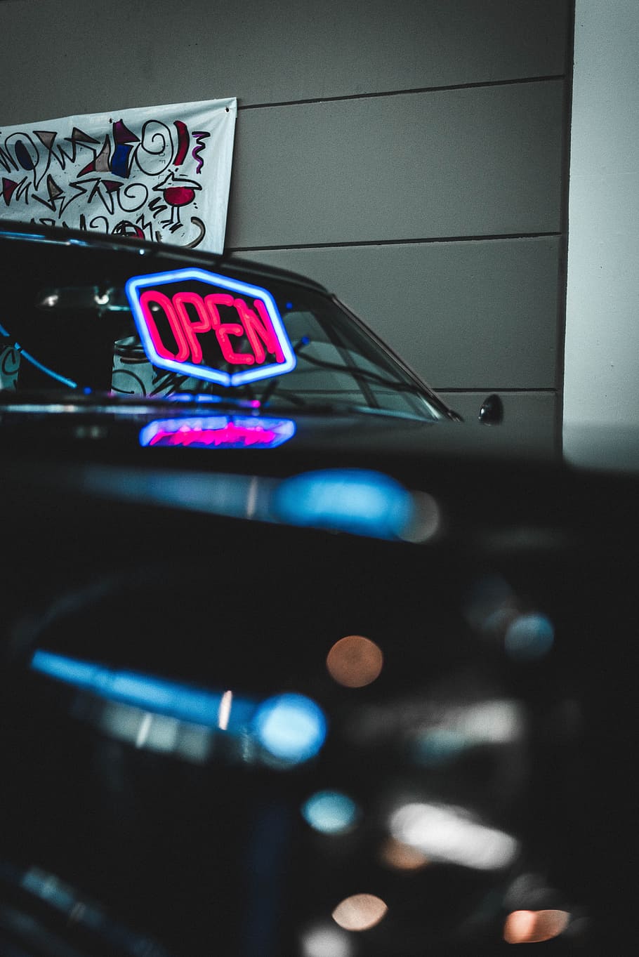 red and blue open neon signage reflecting on vehicle windshield, red and white OPEN signage on car HD wallpaper