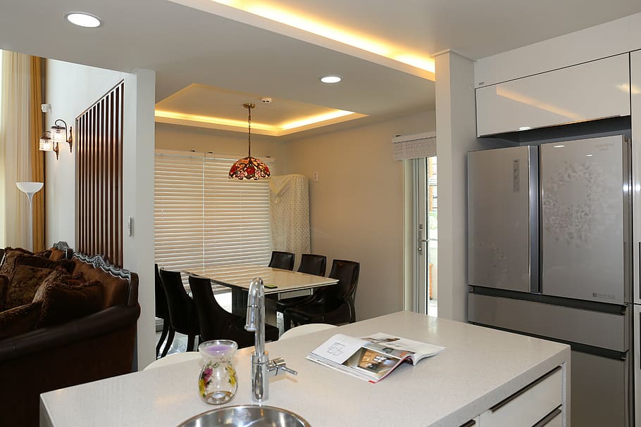 rectangular white wooden dining table set inside white room HD wallpaper