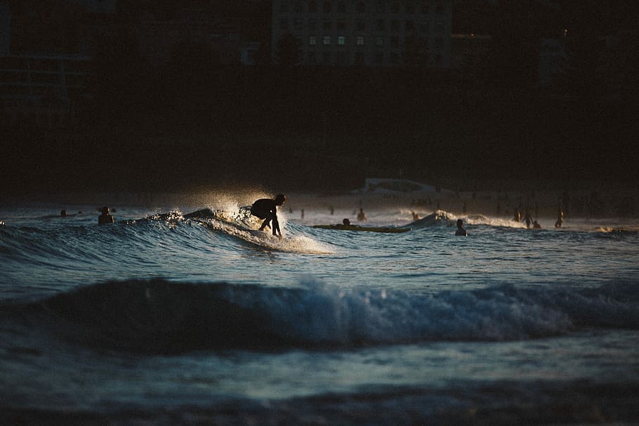 silhouette of people surfing the waves, man surfing in sunset HD wallpaper