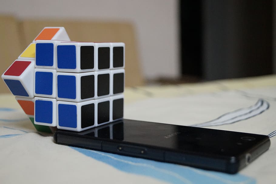 rubik cube, puzzle, game, fun, indoors, no people, focus on foreground HD wallpaper