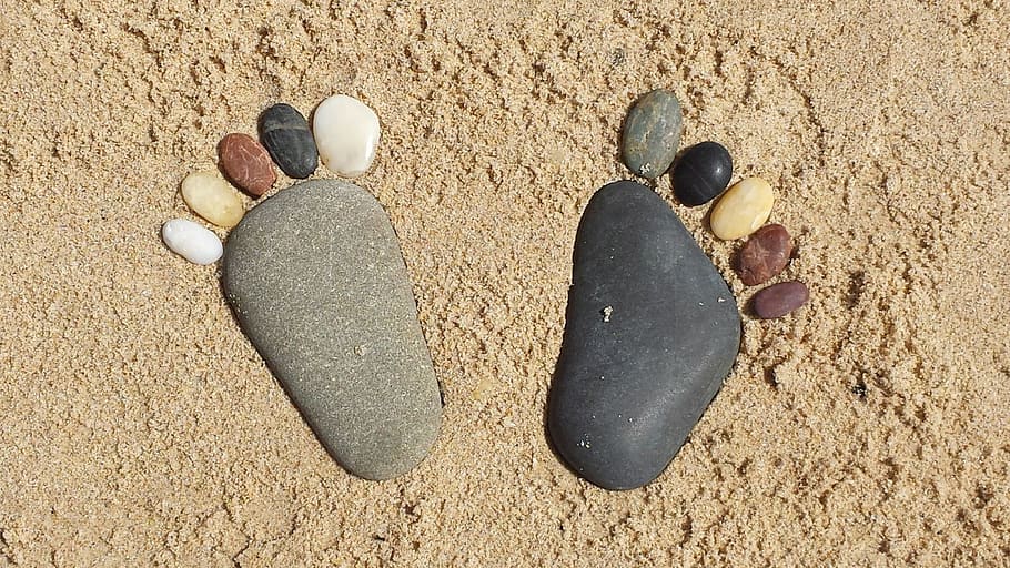 multicolored feet-shaped marble stones, rock, sand, land, beach HD wallpaper