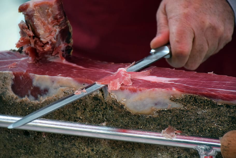 selective focus photo of man slicing meat, prosciutto, cutting, HD wallpaper