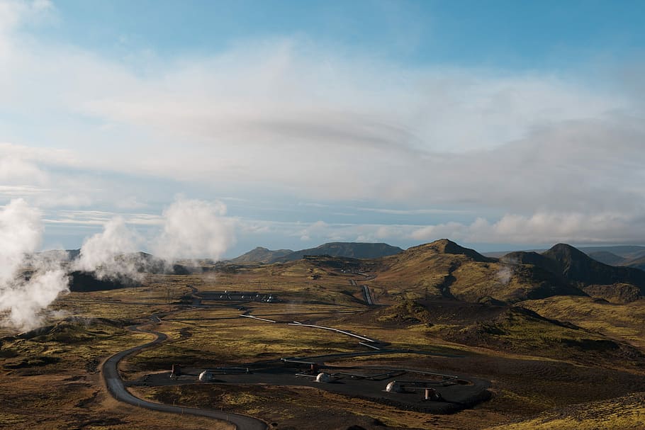 winding road near mountain and volcano, green mountains under cloudy sky HD wallpaper