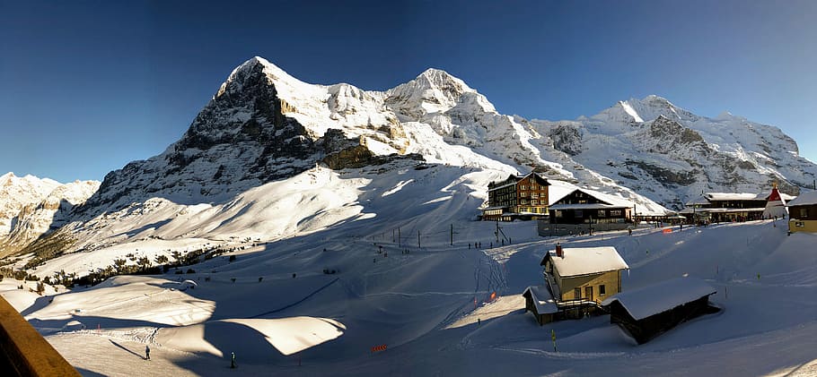 Eiger, Switzerland, aerial photography of house near mountain at daytime HD wallpaper