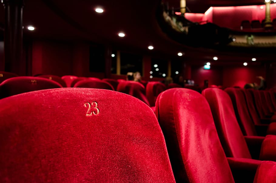 red cinema seat number 23, selective focus photography of red 23 chair, HD wallpaper