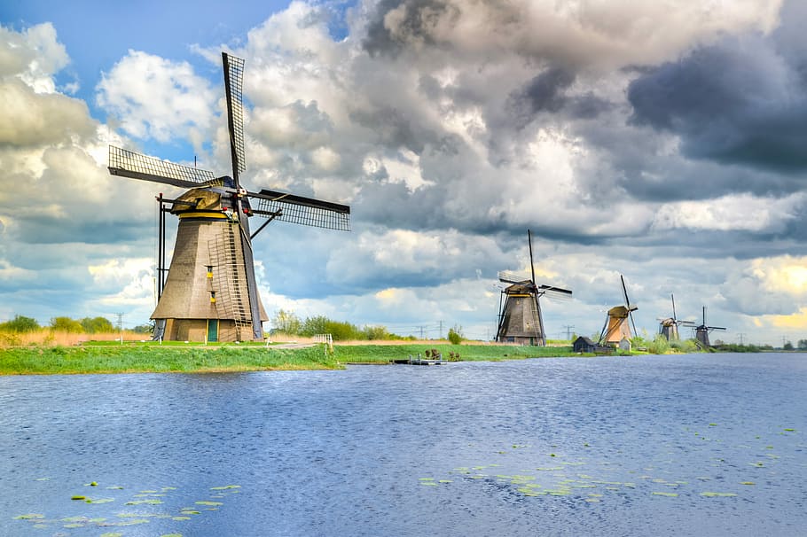 windmill near body of water, kinderdijk, dutch, netherlands, tourism