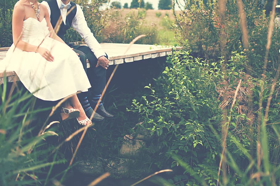 man, couple, love, people, bride, bridge, grass, groom, outdoors HD wallpaper