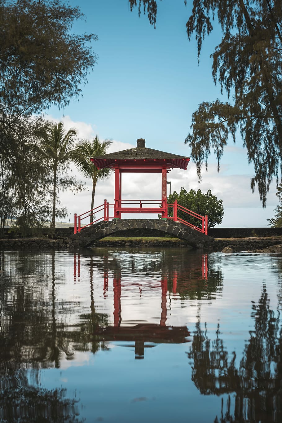 pagoda on bridge, red and black wooden canopy during daytime HD wallpaper