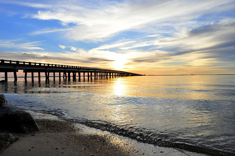 dock on body of water, sunset, bridge, beach, nature, sky, vacation HD wallpaper