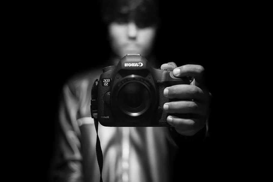 grayscale photography of Justin Bieber, person holding Canon DSLR camera, HD wallpaper